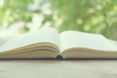 Close-up of open book on table