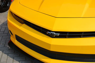 High angle view of yellow car on street