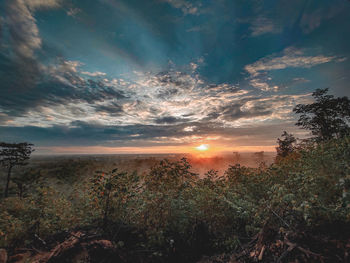 Scenic view of landscape against sky during sunset