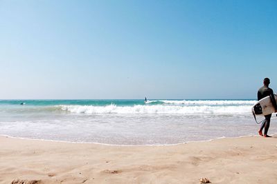 Scenic view of sea against clear sky