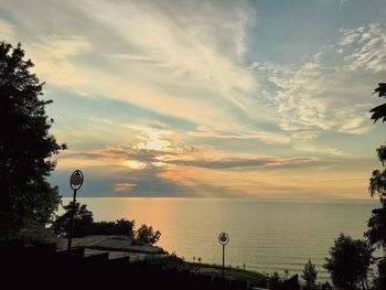 Scenic view of sea against sky at sunset