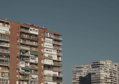 Low angle view of buildings against sky