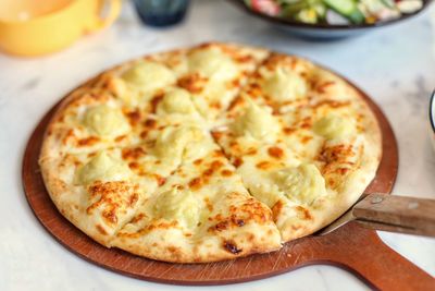 High angle view of pizza on table