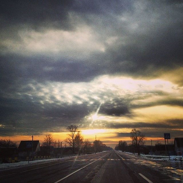 sunset, sky, cloud - sky, transportation, the way forward, road, diminishing perspective, cloudy, dramatic sky, vanishing point, weather, orange color, cloud, nature, beauty in nature, scenics, overcast, street, tranquil scene, atmospheric mood