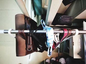 Close-up of bicycle hanging on metal