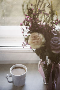Close-up of coffee cup on table
