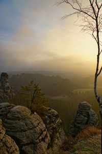 Scenic view of landscape against sky during sunset