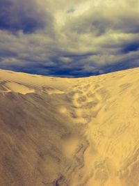 Scenic view of desert against sky