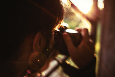 Close-up of person photographing