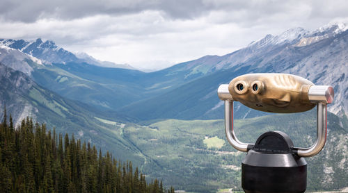 View on alpine valley with tower viewer in foreground,sulphur mountain, banff, alberta, canada