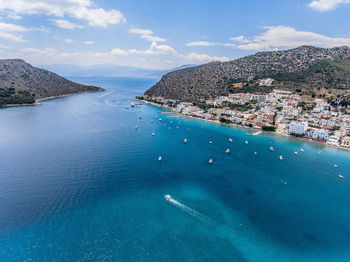 High angle view of sea and shore against sky