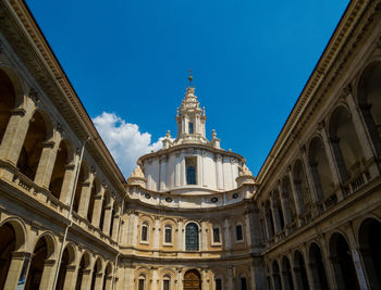 Low angle view of building against blue sky