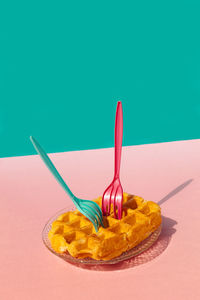 Studio shot of waffle kept in plate on table