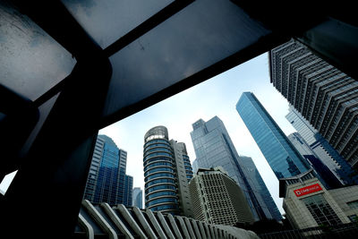 Low angle view of modern buildings against sky