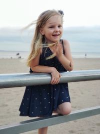 Near the beach girl smiling