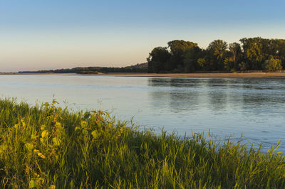 Scenic view of lake against clear sky