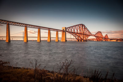 Suspension bridge over river