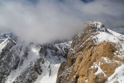 Scenic view of snowcapped mountains against sky. dolomites. italy