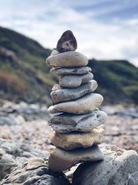 Close-up of stone stack on rock