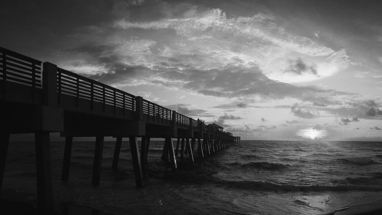 sea, sky, horizon over water, water, beach, cloud - sky, shore, scenics, tranquil scene, tranquility, beauty in nature, built structure, nature, cloudy, sand, cloud, pier, architecture, idyllic, outdoors