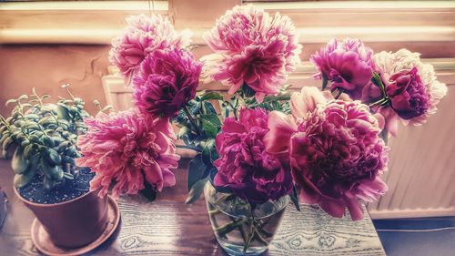 Close-up of flower pot on table