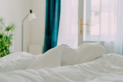 White bed in bedroom