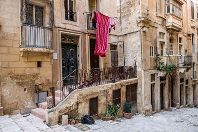 Clothes drying outside building