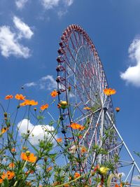 Low angle view of ferris wheel against sky at kasai seaside park