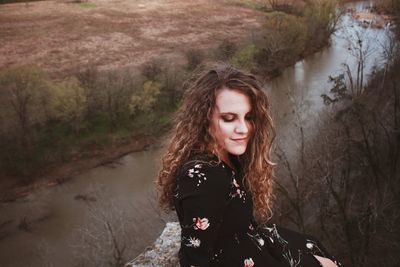 Beautiful young woman in forest