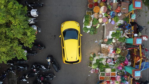 Yellow car at the traditional market