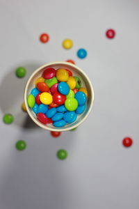 High angle view of multi colored balls on table