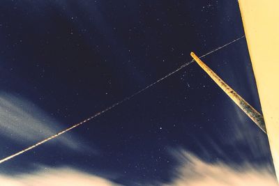 Low angle view of moon against sky at night