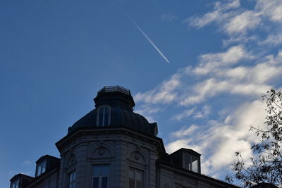 Low angle view of building against blue sky