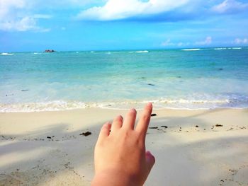 Scenic view of beach against sky