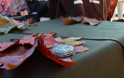 Close-up of dry leaves on table