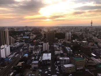 High angle view of cityscape against sky during sunset