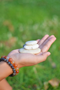 Close-up of hand holding hands