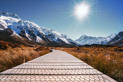 Scenic view of mountains against sky during winter