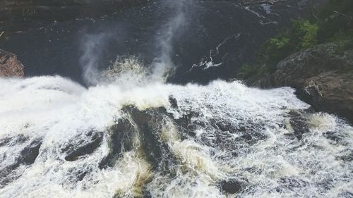View of water splashing on rocks