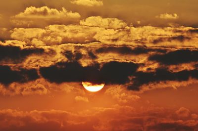 Low angle view of dramatic sky during sunset