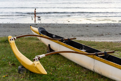 Boats moored on shore