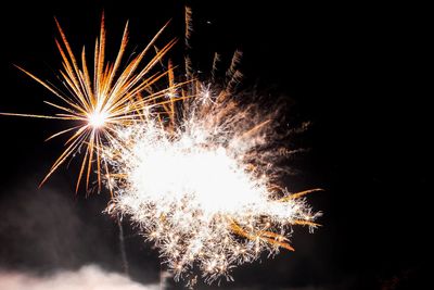 Firework display at night