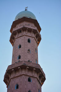 Low angle view of historic building against clear sky