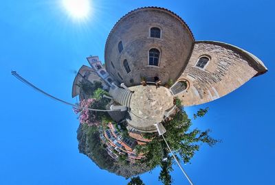 Low angle view of statue against clear blue sky