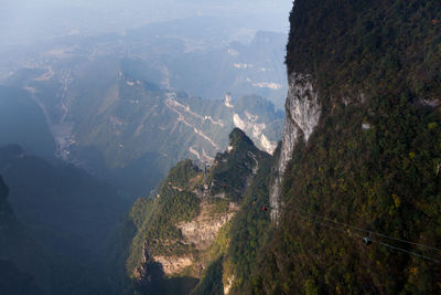 High angle view of trees and mountains against sky