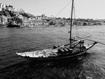 High angle view of boat on river in city