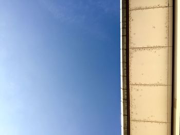 Low angle view of tower against clear blue sky