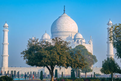 Low angle view of mosque against clear sky