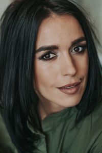 Close-up portrait of a smiling young woman