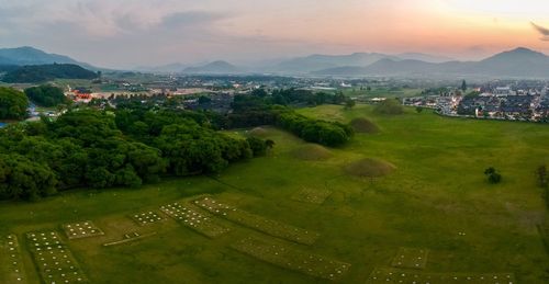 High angle view of townscape against sky at sunset